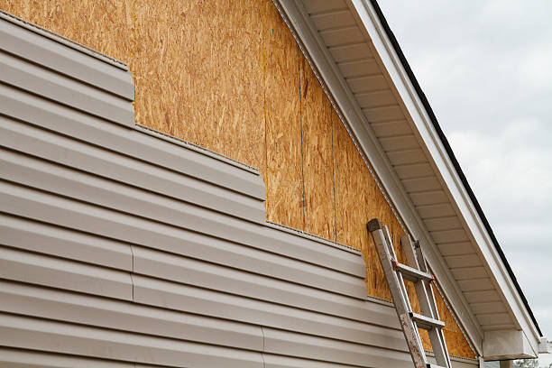 Professional Siding Installation technician working in Frostburg, MD